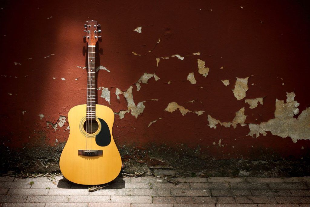 guitar in damp rotting room